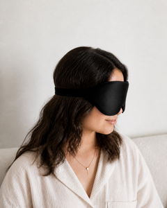 Side detail showing the RestingBelly Sleep Mask strap and fit